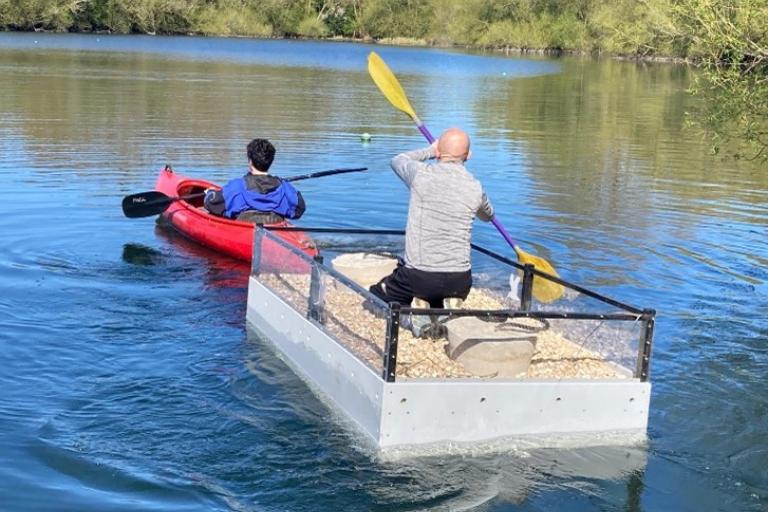 tern nesting raft being towed to anchor the raft in a suitable spot